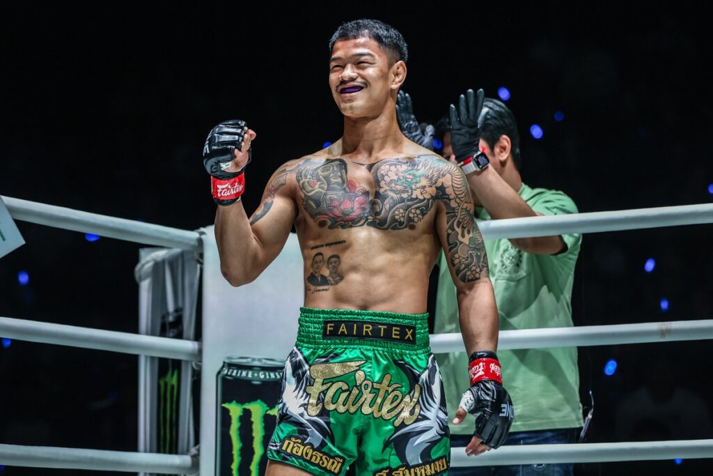 Muay Thai boxer having a Thai tattoo