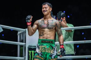 Muay Thai boxer having a Thai tattoo